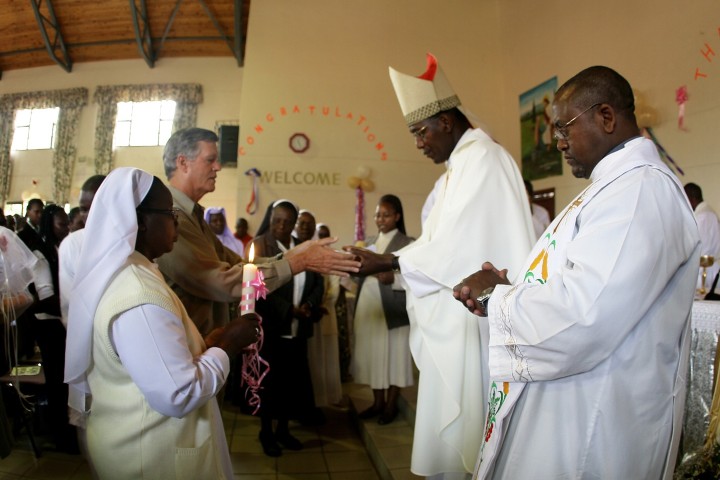 Mr. Steven M. Hilton presents a bowl of soil during the offertory – A sign of richness of the earth and that the Foundation has facilitated growth of the sisters through imparting knowledge and skills via SLDI program.