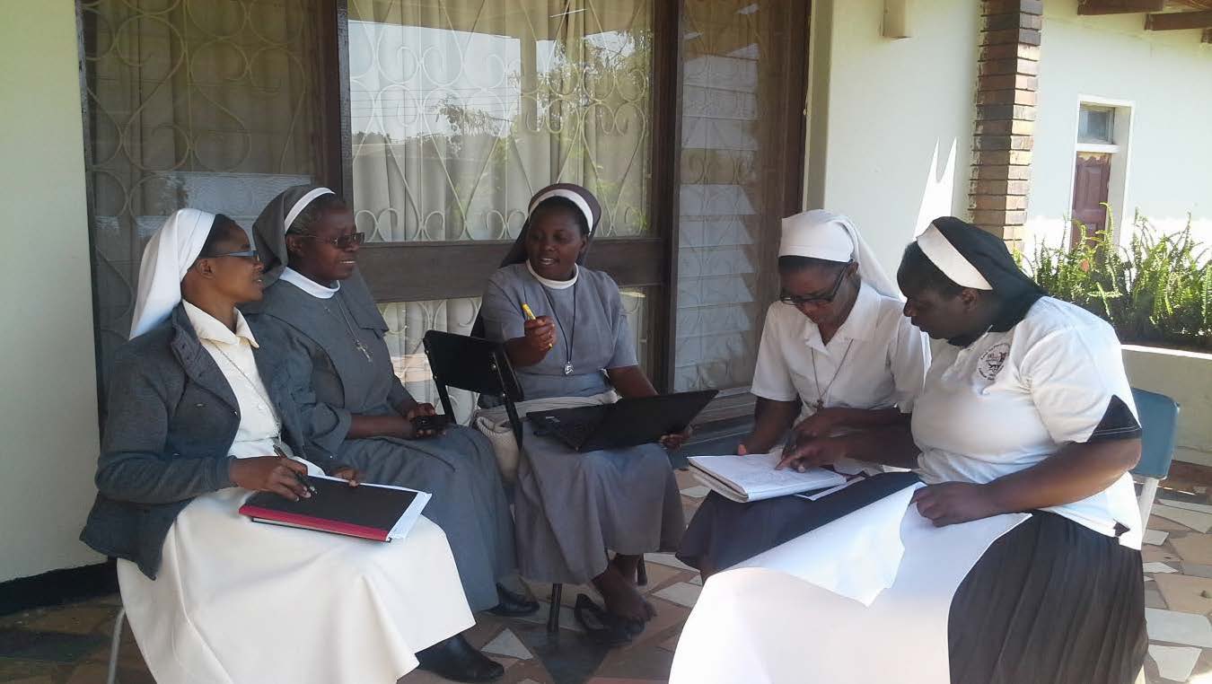 Sisters engage in group work during an Administration workshop in Zambia in 2015.